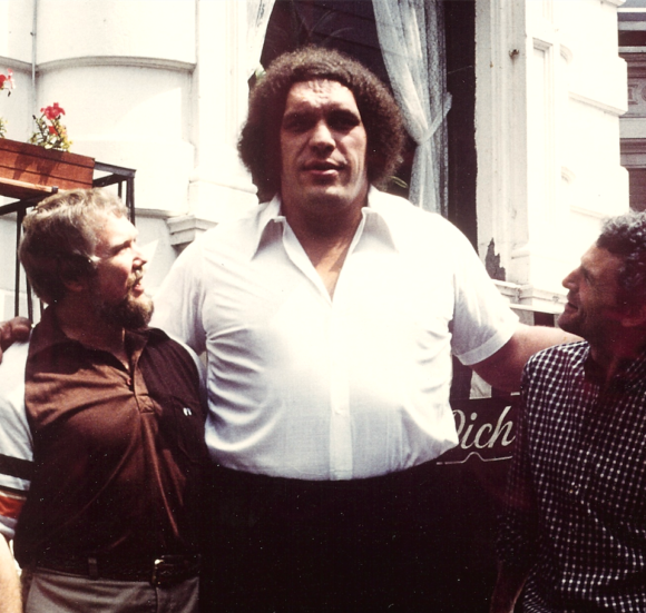 Stark Center co-founder Terry Todd, wrestler Andre the Giant, and a man, circa 1970s.