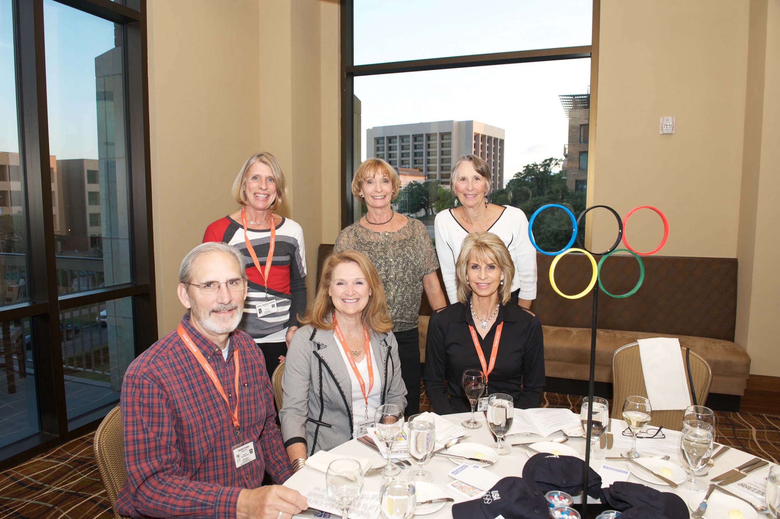Six people at a table at the 1968 U.S. Olympic Team 2012 Reunion.