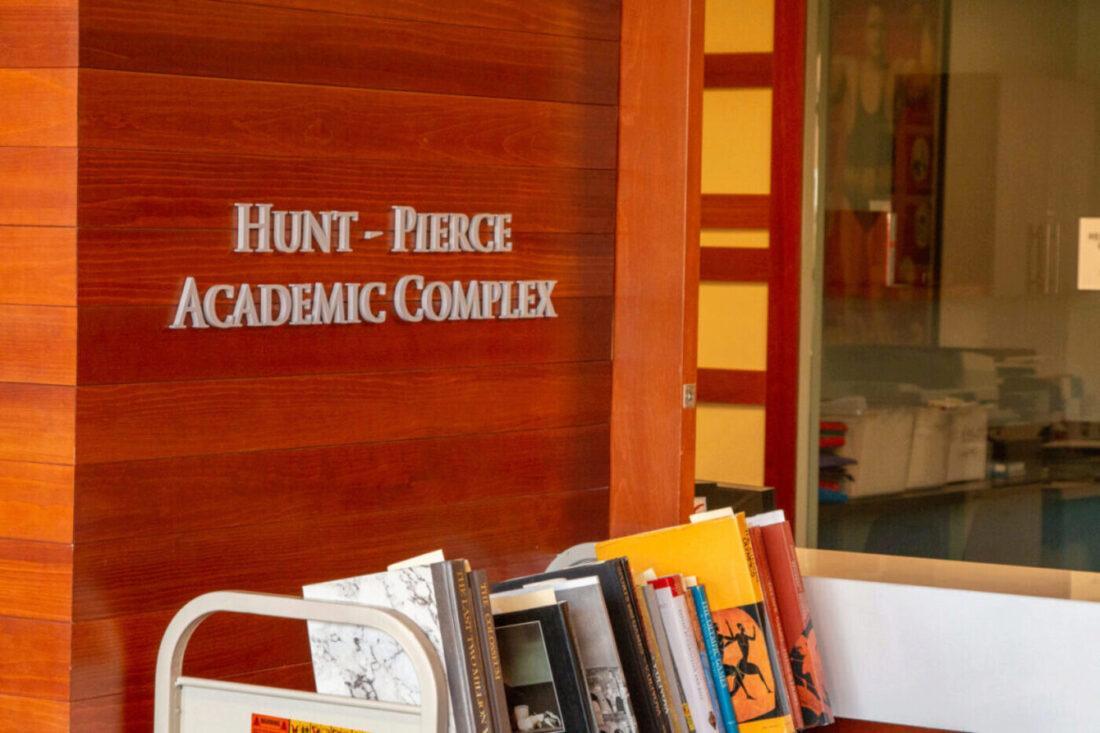 Hunt-Pierce Academic Complex sign on the wall of the Reading Room.