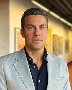 The professional headshot of curator, Kyle R M.