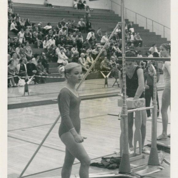 Gymnast Cathy Rigby, just before performing on the uneven bars in competition, from the Steve Wennerstrom Papers.