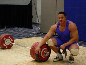 Strongman Mikail Koklyaev after having cleaned and jerked a 529 barbell overhead with two hands, at the Arnold (Schwarzenegger) Strongman Classic in Columbus, Ohio