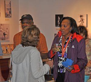 Madeline Manning Mims mingling in Stark Center exhibit area.