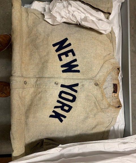 Photo of a New York Yankees Jersey folded inside of an archival box
