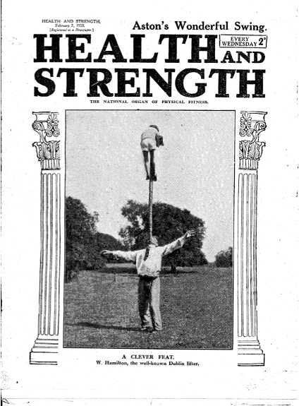 Front cover of Health and Strength February 7, 1920. A man balances a pole on his chin. A child balances at the top of the pole.