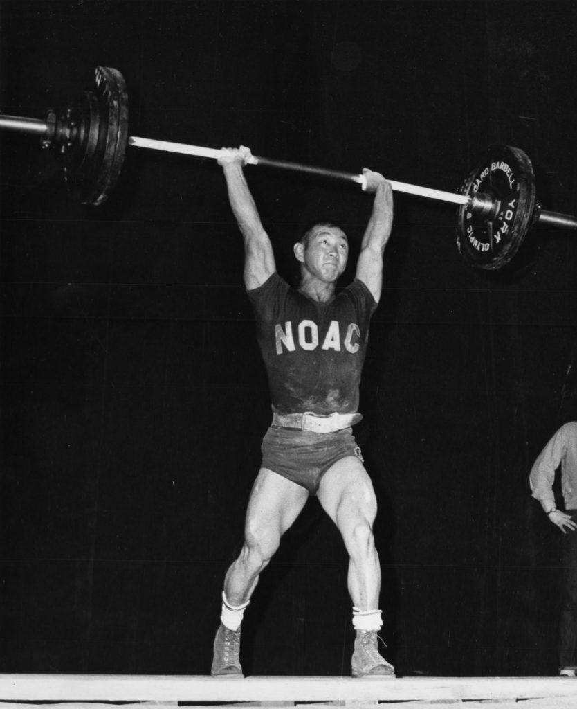 Walter Imahara completing a clean and jerk.