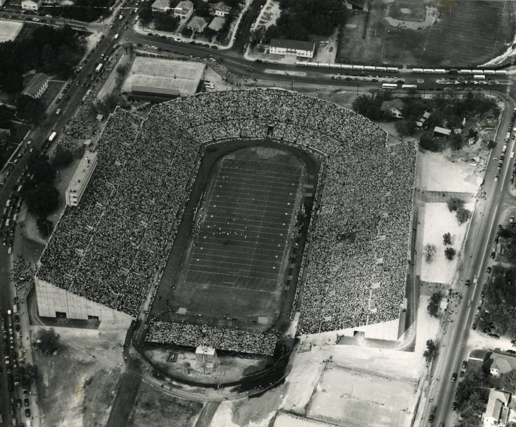 A 1948 aerial view of the University of Texas Memorial Stadium with stands filled.