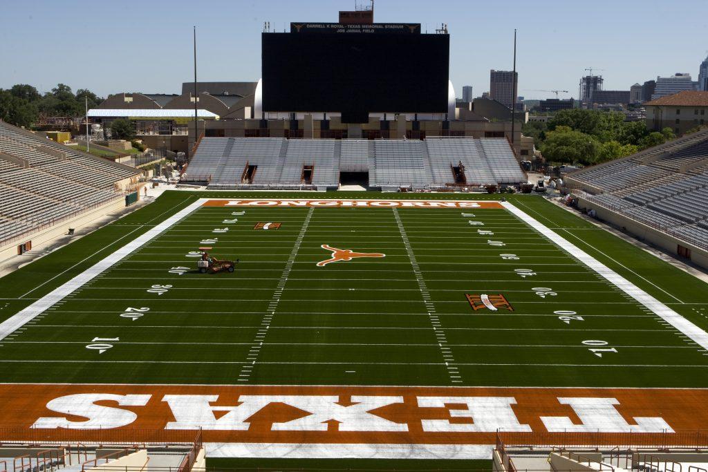 A color photo of DKR Texas Memorial Stadium looking at the south end of the field where the new "godzillatron" has been installed.