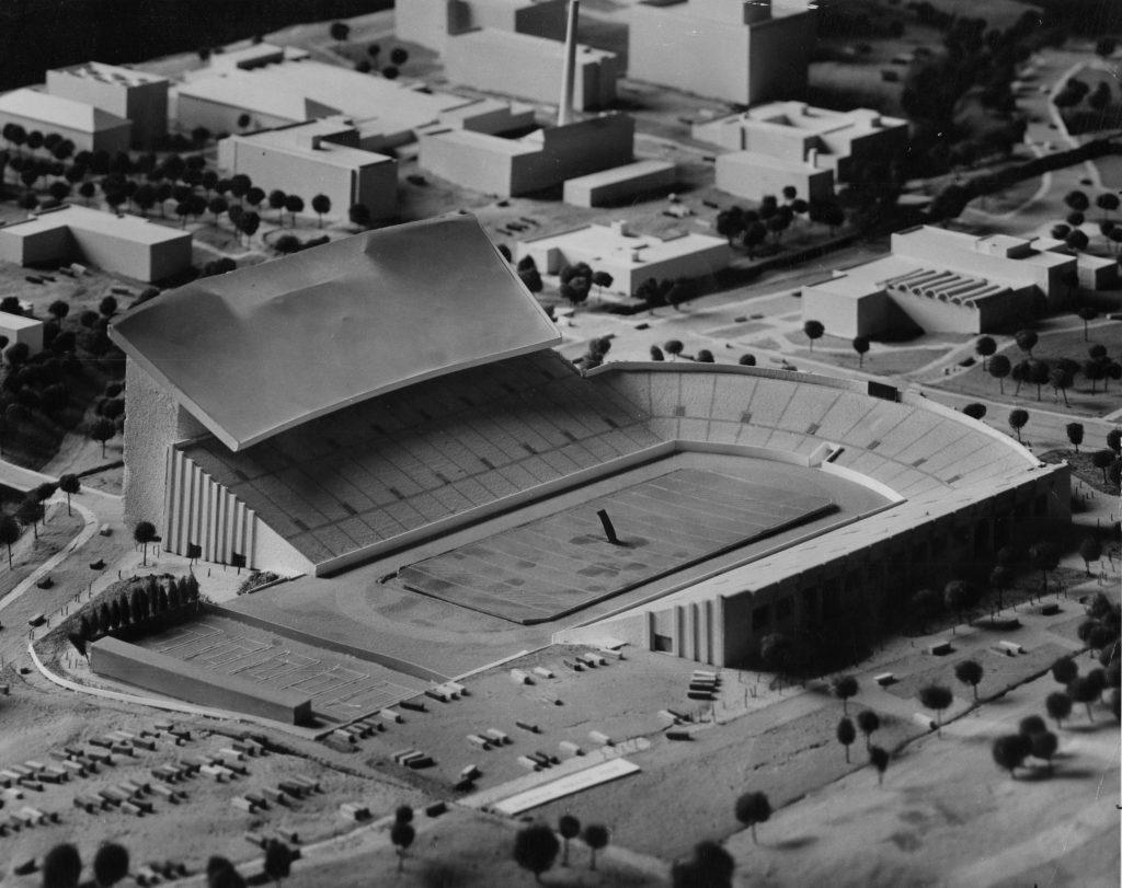 A black and white photo of the architectural model for the west side upper deck expansion project at Texas Memorial Stadium.