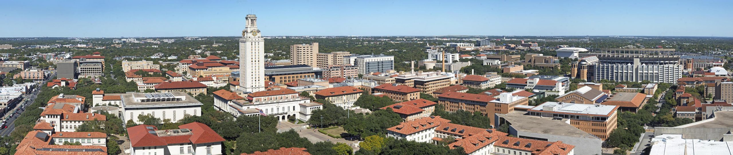 Color aerial panoramic photograph of the UT-Austin campus taken from the roof of Dobie circa 2017.