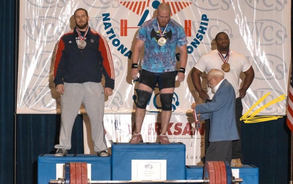 Jack Hughes presenting medals in the 105kg weight category at the 2007 National Championships