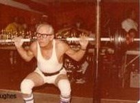 Jack Hughes powerlifting in the Master's divisio in a squat