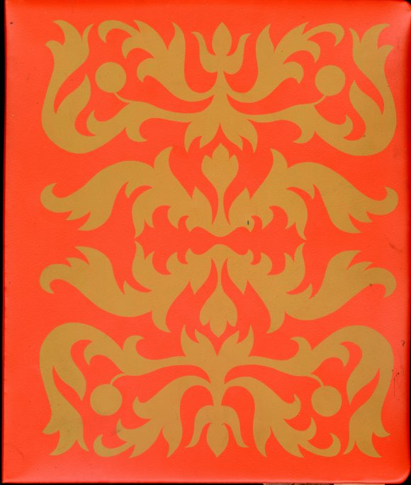 Red Cover with gold leafy patterned of a scrapbook