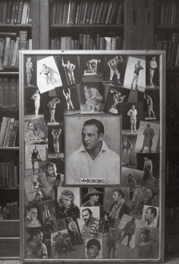 Framed collage with multiple images of Joe Bonomo, has large portrait of Bonomo in center.
