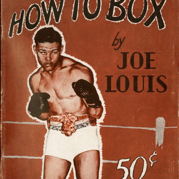 The cover of Joe Louis's booklet "How to Box." Red cover with photo of Joe Louis in a boxing stance with 50 cents.
