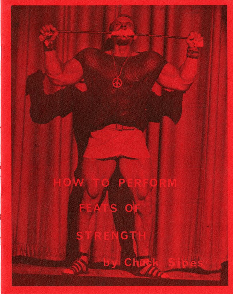 Red cover of Chuck Sipes Feats of Strength booklet with him bending a bar in his mouth.