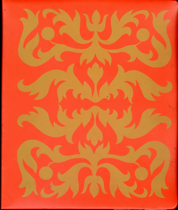 A red background with gold leafy designs.