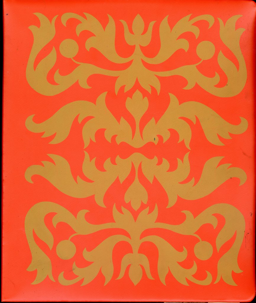 A red background with gold leafy designs.