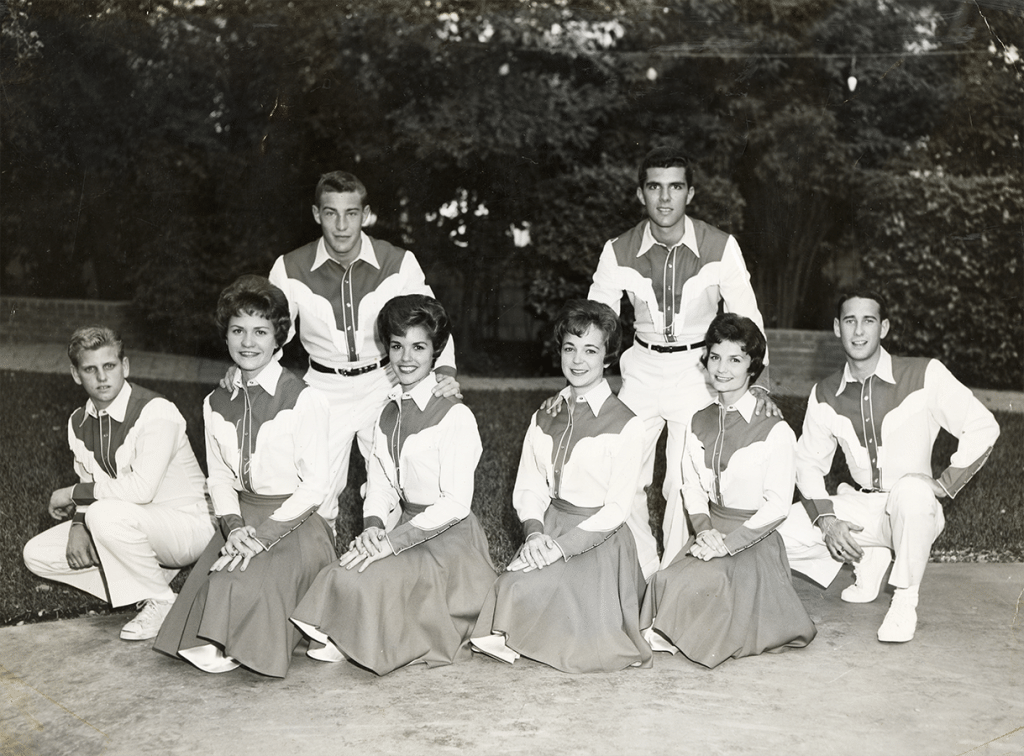 Black and white photo of the 1961 University of Texas cheer team.